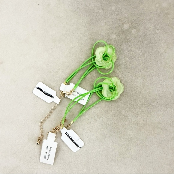NWT Urban Outfitters 2 Green Lis Corded Flower Pendant Bracelets - Picture 1 of 3